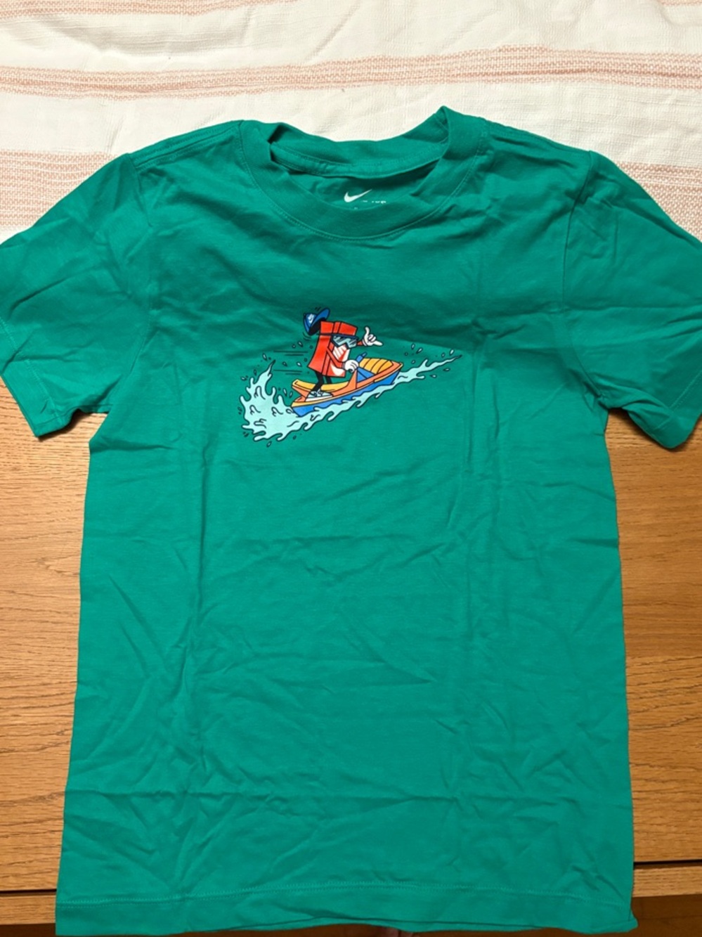 Nike Men’s Teal Surfing Graphic Short Sleeve Tee